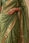 Ganga Ghat ~ Banarasi Pure Tissue Silk Saree In Olive Green With with Rich Lachha Border - verymuchindian.com