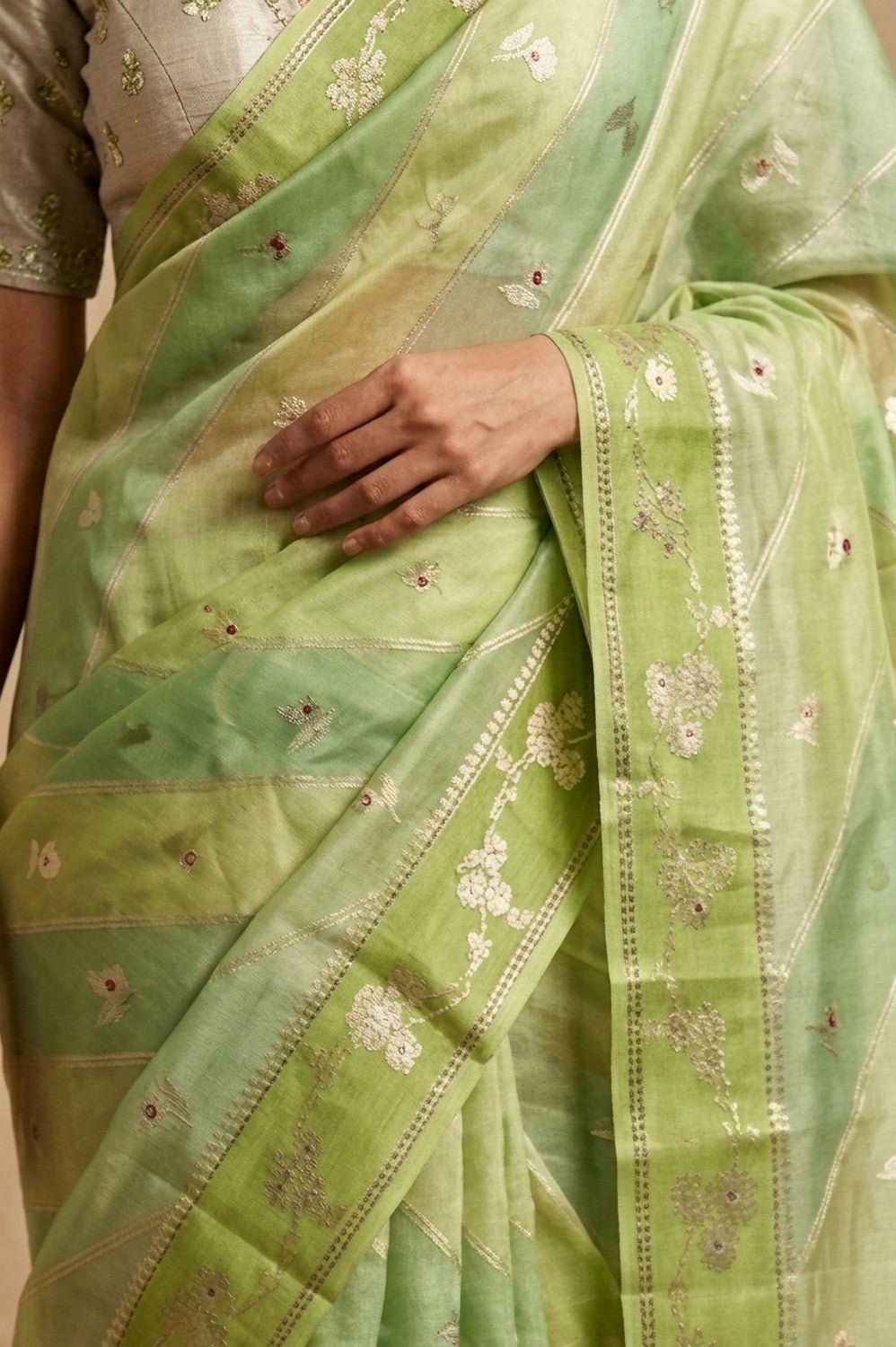 Ganga Ghat ~ Banarasi PureRaw Silk Saree with Silver Zari Stripes and Delicate Floral In Dual - Tone Lime Green - verymuchindian.com