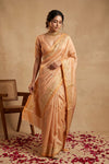 Ganga Ghat ~ Banarasi Pure Katan silk Saree with Elegant Gold Zari Weave and Floral Border In Peach Pastel