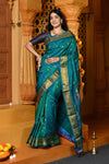 Gaurangi ~ Handloom Pure Silk Maharani Paithani with Majestic Maharani Pallu in Turquoise Blue - verymuchindian.com