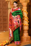 Gaurangi ~ Handloom Pure Silk Paithani Saree with Handcrafted Peacock Zari Border in Royal Green - verymuchindian.com