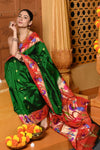 Gaurangi ~ Handloom Pure Silk Paithani Saree with Handcrafted Peacock Zari Border in Royal Green - verymuchindian.com