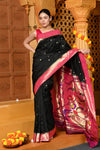 Gaurangi ~ Handloom Pure Silk Pink Muniya Border Saree With Handcrafted Peacock Pallu in Black - verymuchindian.com