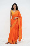 Mulmuli ~ Pure Handwoven Mul Cotton Saree in Orange with Golden Border - verymuchindian.com