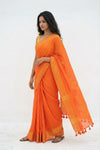 Mulmuli ~ Pure Handwoven Mul Cotton Saree in Orange with Golden Border - verymuchindian.com