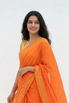 Mulmuli ~ Pure Handwoven Mul Cotton Saree in Orange with Golden Border - verymuchindian.com