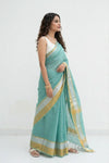 Mulmuli ~ Pure Handwoven Mul Cotton Saree in Sea Blue with Golden Border - verymuchindian.com