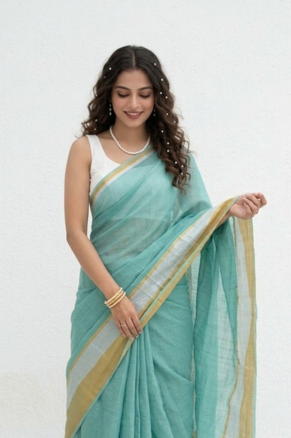 Mulmuli ~ Pure Handwoven Mul Cotton Saree in Sea Blue with Golden Border - verymuchindian.com