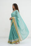 Mulmuli ~ Pure Handwoven Mul Cotton Saree in Sea Blue with Golden Border - verymuchindian.com