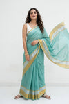 Mulmuli ~ Pure Handwoven Mul Cotton Saree in Sea Blue with Golden Border - verymuchindian.com