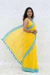 Mulmuli ~ Pure Handwoven Mul Cotton saree in Sunrise Yellow with Blue Border - verymuchindian.com