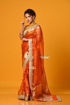 Param Sundari ~ Banarasi Organza Silk Tissue Saree with Designer Lace in Beautiful Sunset Orange - verymuchindian.com