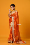 Param Sundari ~ Banarasi Organza Silk Tissue Saree with Designer Lace in Beautiful Sunset Orange - verymuchindian.com
