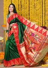 Rajsi~ EXCLUSIVE! Handloom Pure Silk Muniya Temple Border Saree WIth Handcrafted Parrot Pallu in Dark Green - verymuchindian.com