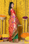 Rajsi~ EXCLUSIVE! Handloom Pure Silk Muniya Temple Border Saree WIth Handcrafted Parrot Pallu in Dark Green - verymuchindian.com