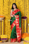 Rajsi~ EXCLUSIVE! Handloom Pure Silk Muniya Temple Border Saree WIth Handcrafted Parrot Pallu in Dark Green - verymuchindian.com