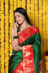 Rajsi~ EXCLUSIVE! Handloom Pure Silk Muniya Temple Border Saree WIth Handcrafted Parrot Pallu in Dark Green - verymuchindian.com