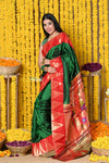 Rajsi~ EXCLUSIVE! Handloom Pure Silk Muniya Temple Border Saree WIth Handcrafted Parrot Pallu in Dark Green - verymuchindian.com