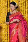 Rajsi~ Handloom Pure Silk Muniya Border Saree WIth Handcrafted Peacock Pallu in Orangish Pink - verymuchindian.com