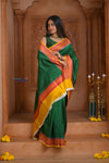 Shubh Lakshmi ~ Handloom Tussar Silk Saree with Digital Print in Dark Green and Orange