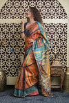 Shubh Lakshmi 2.0~ Handloom Tussar Silk Saree with Handpainted Scripture Pallu in Orange and Blue