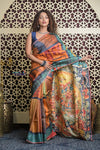 Shubh Lakshmi 2.0~ Handloom Tussar Silk Saree with Handpainted Scripture Pallu in Orange and Blue