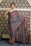 Shubh Lakshmi 2.0 ~ Exclusive Designer Ajrakh Handblock Hand-stitched Mirror Work Modal Silk Saree in Black and Brown - verymuchindian.com