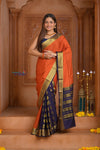 Shubh Lakshmi ~ Handloom Pure Mysore Silk Patli Pallu Crepe Saree in Orange and Dark Blue (Silk Mark Certified) - verymuchindian.com