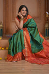 Shubh Lakshmi ~ Handloom Pure Silk Ikkat Patola Saree in Dark Green and Roughe Red (Silk Mark Certified) - verymuchindian.com