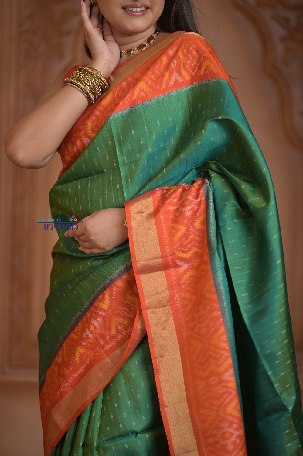 Shubh Lakshmi ~ Handloom Pure Silk Ikkat Patola Saree in Dark Green and Roughe Red (Silk Mark Certified) - verymuchindian.com