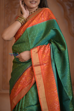 Shubh Lakshmi ~ Handloom Pure Silk Ikkat Patola Saree in Dark Green and Roughe Red (Silk Mark Certified) - verymuchindian.com