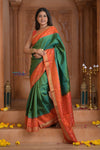 Shubh Lakshmi ~ Handloom Pure Silk Ikkat Patola Saree in Dark Green and Roughe Red (Silk Mark Certified) - verymuchindian.com