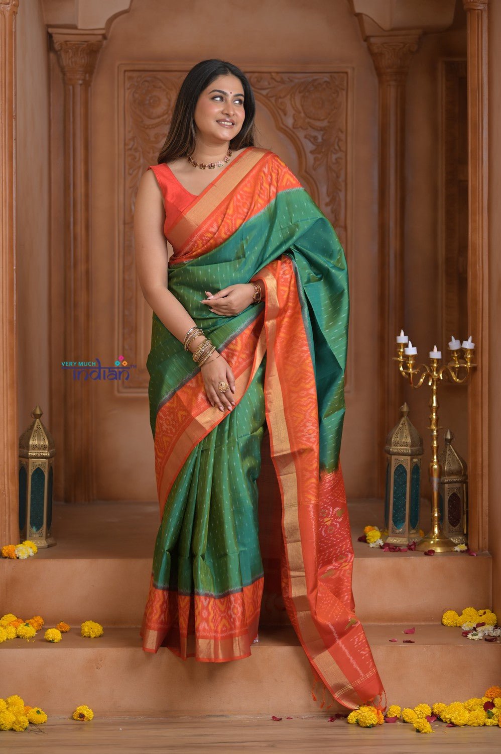 Shubh Lakshmi ~ Handloom Pure Silk Ikkat Patola Saree in Dark Green and Roughe Red (Silk Mark Certified) - verymuchindian.com
