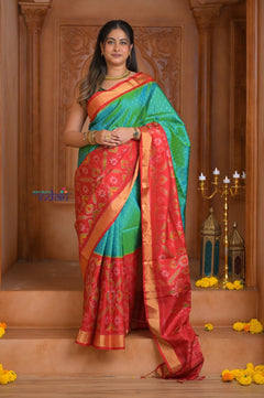 Shubh Lakshmi ~ Handloom Pure Silk Ikkat Patola Saree in Dual Tone Green and Red (Silk Mark Certified) - verymuchindian.com