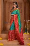 Shubh Lakshmi ~ Handloom Pure Silk Ikkat Patola Saree in Dual Tone Green and Red (Silk Mark Certified) - verymuchindian.com