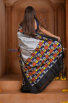 Shubh Lakshmi ~ Handloom Pure Silk Ikkat Patola Saree in Grey and Black (Silk Mark Certified) - verymuchindian.com