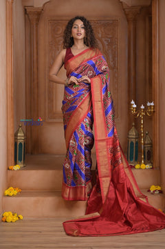 Shubh Lakshmi ~ Handloom Pure Silk Ikkat Patola Saree in Ocean Blue and Roughe Red (Silk Mark Certified) - verymuchindian.com