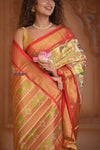 Shubh Lakshmi ~ Handloom Pure Silk Ikkat Patola Saree in Off White and Red (Silk Mark Certified) - verymuchindian.com