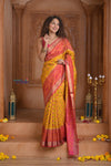 Shubh Lakshmi ~ Handloom Pure Silk Ikkat Patola Saree in Turmeric Yellow and Red (Silk Mark Certified) - verymuchindian.com