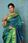 Tyohaar ~ Chandrakor: Handloom Pure Paithani Saree with Traditional Peacock Pallu ~ Peacock Blue with Fresh Green Border (By Government Certified Weavers) - verymuchindian.com
