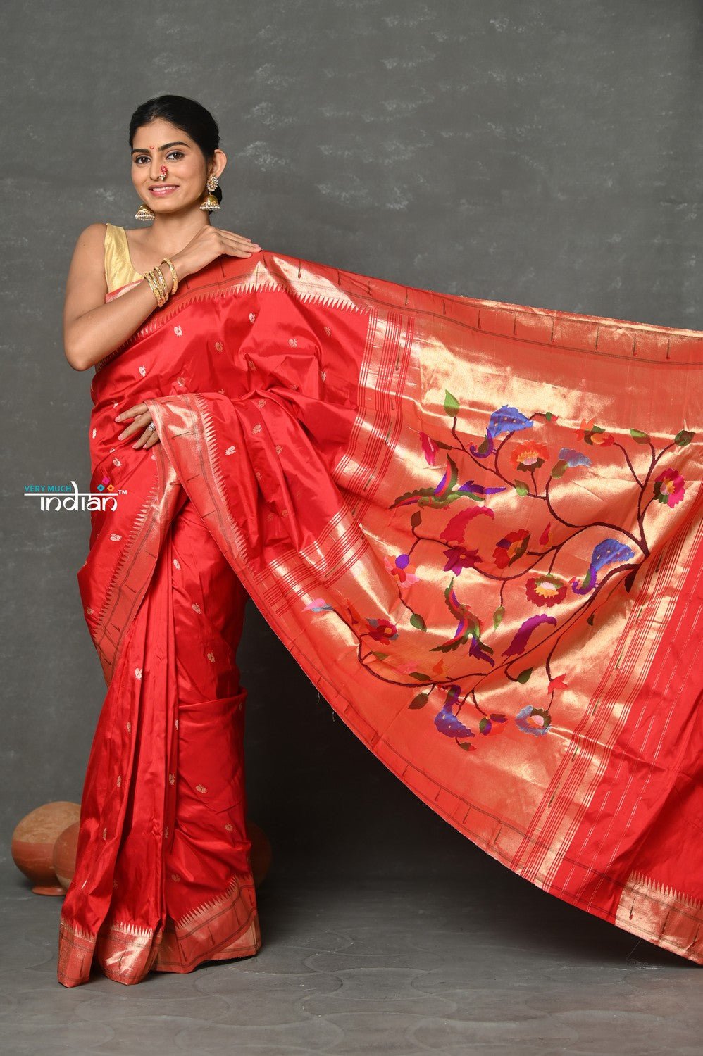 Tyohaar~Designed By VMI ~ Handloom Pure Silk Muniya Borde with Peacock Parrot Pallu in Bright Red - verymuchindian.com
