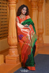 Virasat ~ Handloom Pure Silk Muniya Border Paithani with Peacock Pallu in in Royal Green - verymuchindian.com