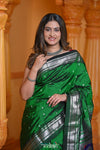 Virasat ~ Handloom Pure Silk Paithani Silver Zari with Peacock Pallu in in Royal Green - verymuchindian.com