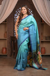 Bengal Gatha ~ Handloom Tussar Silk Saree with Handpainted Radha Krishna Pallu in Ocean Blue