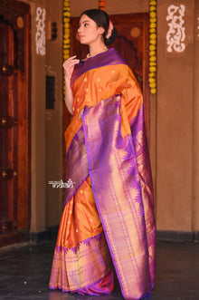  Raaga~ Traditional Handloom Pure Silk Orange Gold Gadwal with Purple Border and Pallu.