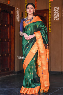  Raaga~ Traditional Handloom Pure Silk Royal Green Paithani with Orange Border and Unique Pallu.
