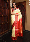 Rajsi~ Pure Silk Handloom Maharani Paithani in a perfect combination of Off White and Red.