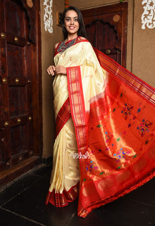  Rajsi~ Pure Silk Handloom Maharani Paithani in a perfect combination of Off White and Red.