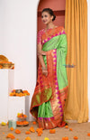 HERITAGE WEAVE ! Premium Handloom Pista Green Muniya Border Paithani With Grand Peacock Pallu - verymuchindian.com