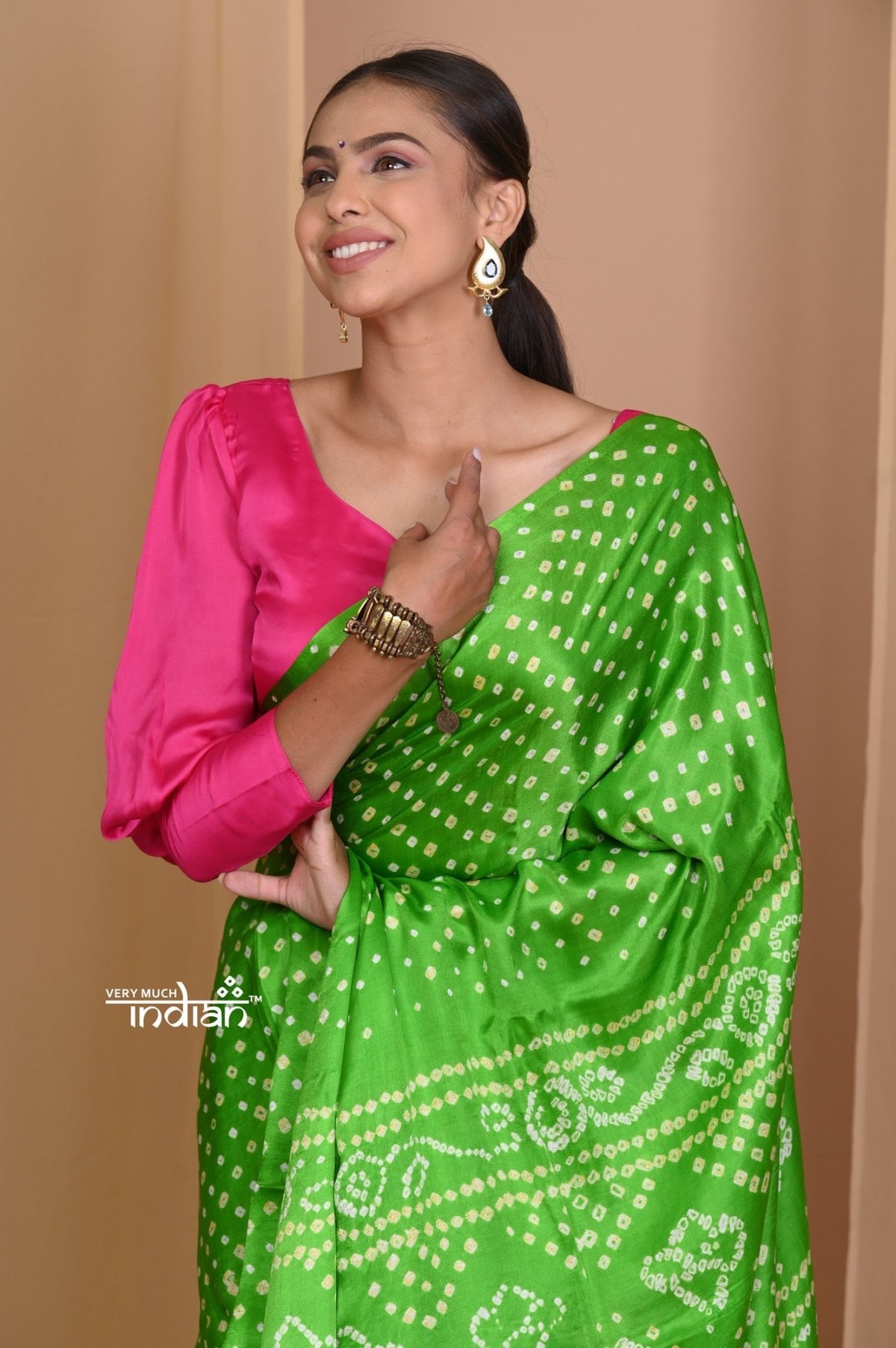Pehal~ Traditional Blade Green Gajji silk Saree with Golden Bandhani Weave. - verymuchindian.com